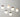 Five modern pendant lights with glowing frosted white spherical shades, dark brown circular accents, and light wood ring details, suspended by thin cords against a neutral gray background.