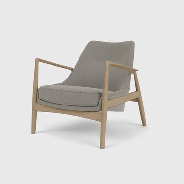 Audo Copenhagen - The Seal Lounge Chair - Natural Oak, upholstered in the fabric re-wool