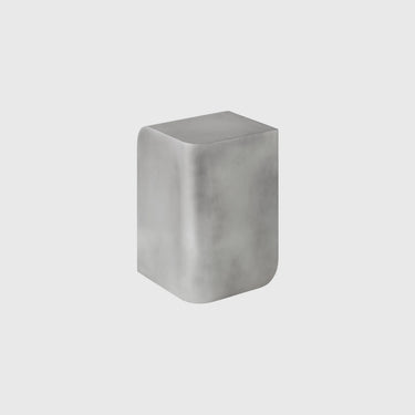 Audo Copenhagen - Volume Side Table with soft mid century modern structural forms in silver aluminium.
