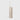 A modern cylindrical table lamp with a rounded top, crafted from beige travertine stone, featuring a slim white cord and a thin vertical white stem, set against a solid light gray background.