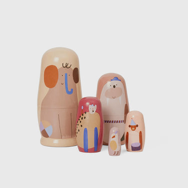Set of 5 nesting dolls with animal illustration detail.