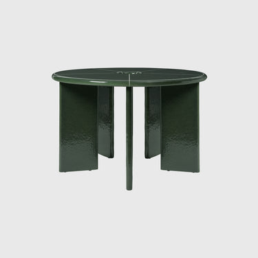 Green round table on a white background
