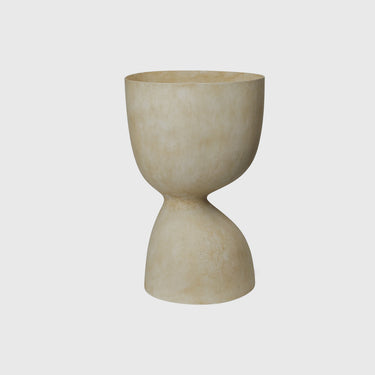 A beige, tall, fiber stone pot suitable for indoor and outdoor use.