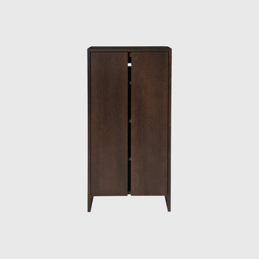 Wooden cabinet with two doors on a white background