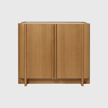 Wooden cabinet with two doors on a white background