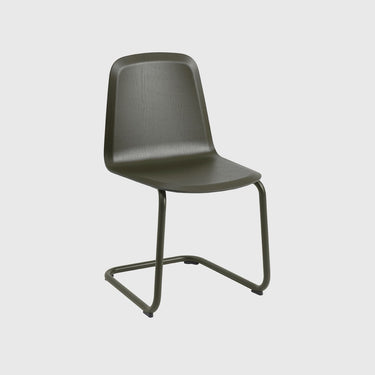 A modern black molded plastic chair with a cantilevered metal base, shown against a solid light gray background.