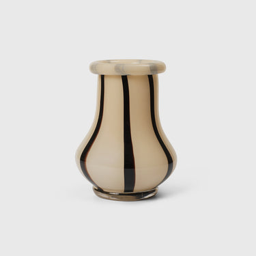 Decorative vase with black stripes on a white background