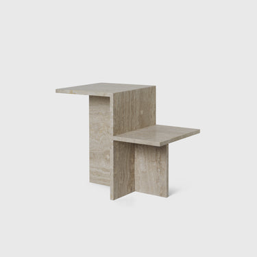 Travertine side table made on a light grey background.