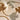 Decorative rug with abstract leaf patterns on a neutral background