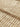Close-up of a textured beige carpet
