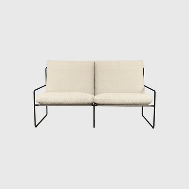 A beige two-seater outdoor sofa with a steel frame and Pure Bouclé fabric upholstery, designed by Ferm Living.