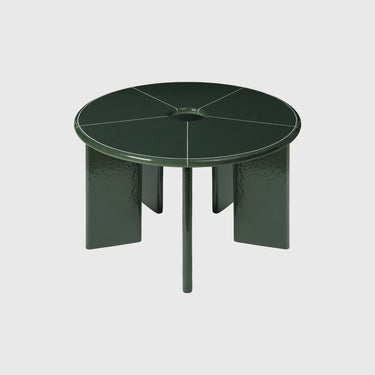 Green round table on a white background