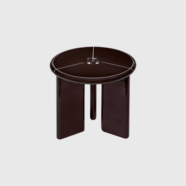 Dark brown side table with a circular top on a light gray background