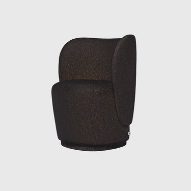 A modern barrel-style armchair upholstered in a dark brown textured fabric, shown from a three-quarters angle against a light gray background.