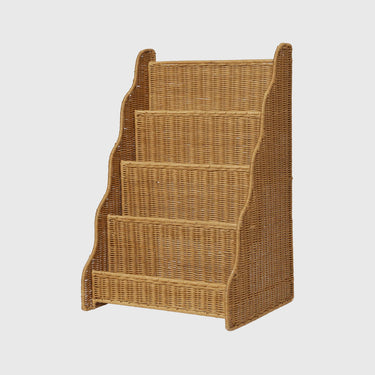 A five-tier wicker magazine rack with a scalloped side panel, shown against a solid light gray background.