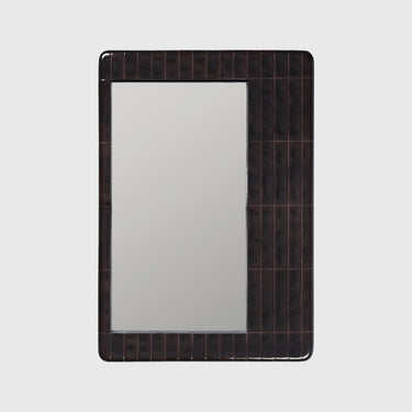 A rectangular wall mirror with a dark brown textured tiled frame, shown against a light gray background.