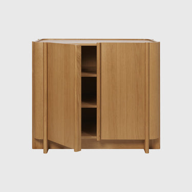 Wooden cabinet with two doors on a white background