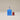 Perfume oil bottle labeled 'Electric Dreams' by Gentle Habits on a beige background