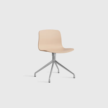 Beige chair with metal base on a white background