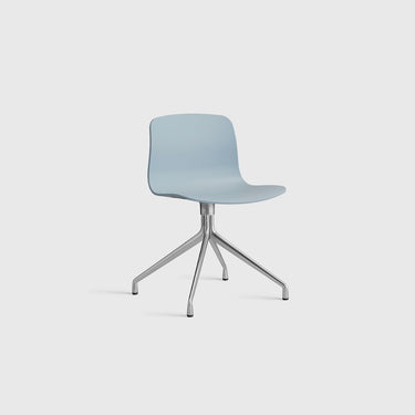 Light blue chair with metal base on a white background