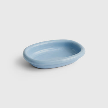 Light blue ceramic soap dish on a white background