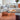 Hay - Slit Table Oblong polished mirror with Bella coffee table and Mags Sofa