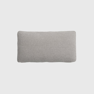 A rectangular lumbar-style throw pillow in a light gray textured fabric, shown from a top-down view against a solid light gray background.