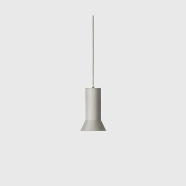 A minimalist pendant light with a matte gray cylindrical shade and a thin vertical rod, shown against a solid light gray background.