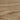 A close-up texture of light brown wood grain with natural wavy patterns and variations in tone.